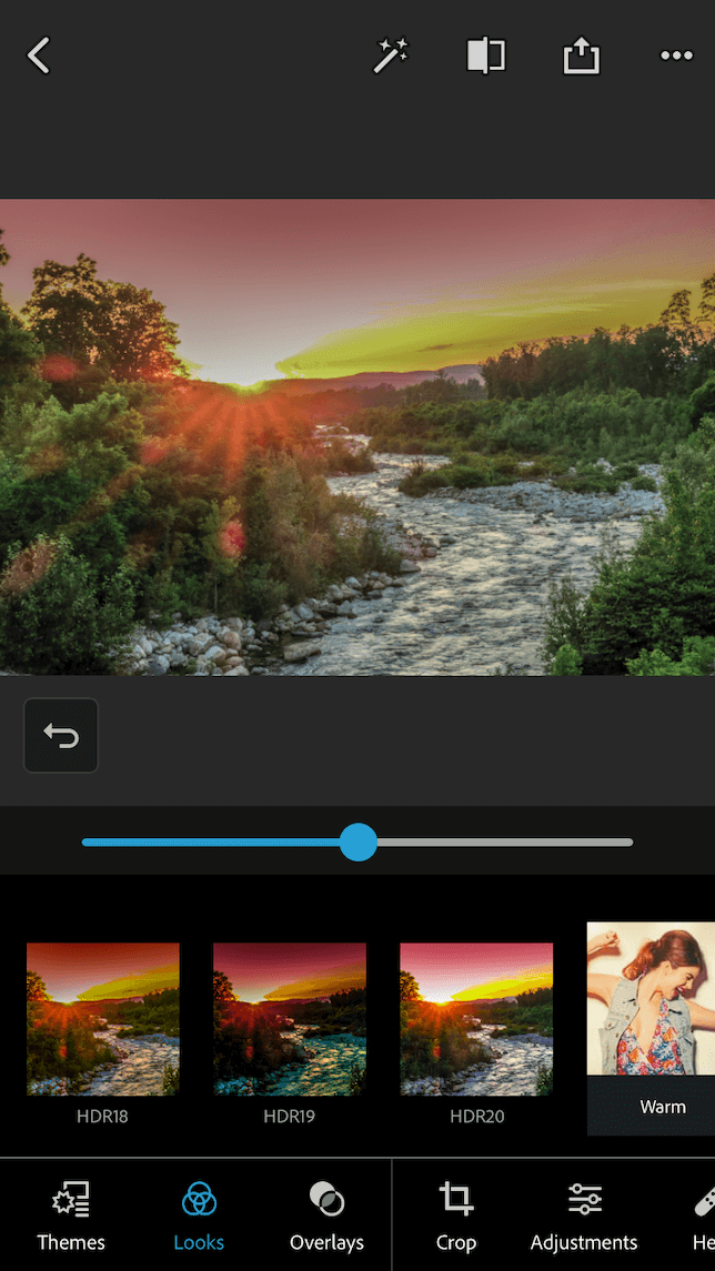 Una captura de pantalla de una puesta de sol que demuestra los efectos posteriores de un filtro HDR en una foto subexpuesta.